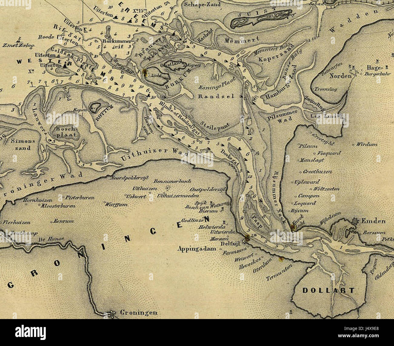 Questa è una mappa del 1883 del Mare del Nord, incentrata sulla regione del fiume Eems. Fornisce una panoramica geografica storica dell'area, compresi i percorsi d'acqua e le caratteristiche costiere. Foto Stock