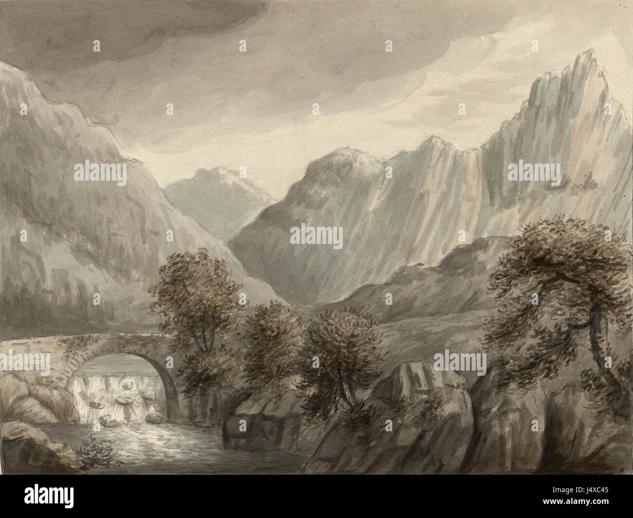 Questa fotografia offre una vista mozzafiato della catena montuosa di Snowdonia, che mostra il paesaggio aspro e la bellezza naturale del Galles del Nord, famoso per le sue cime e le vedute panoramiche. Foto Stock