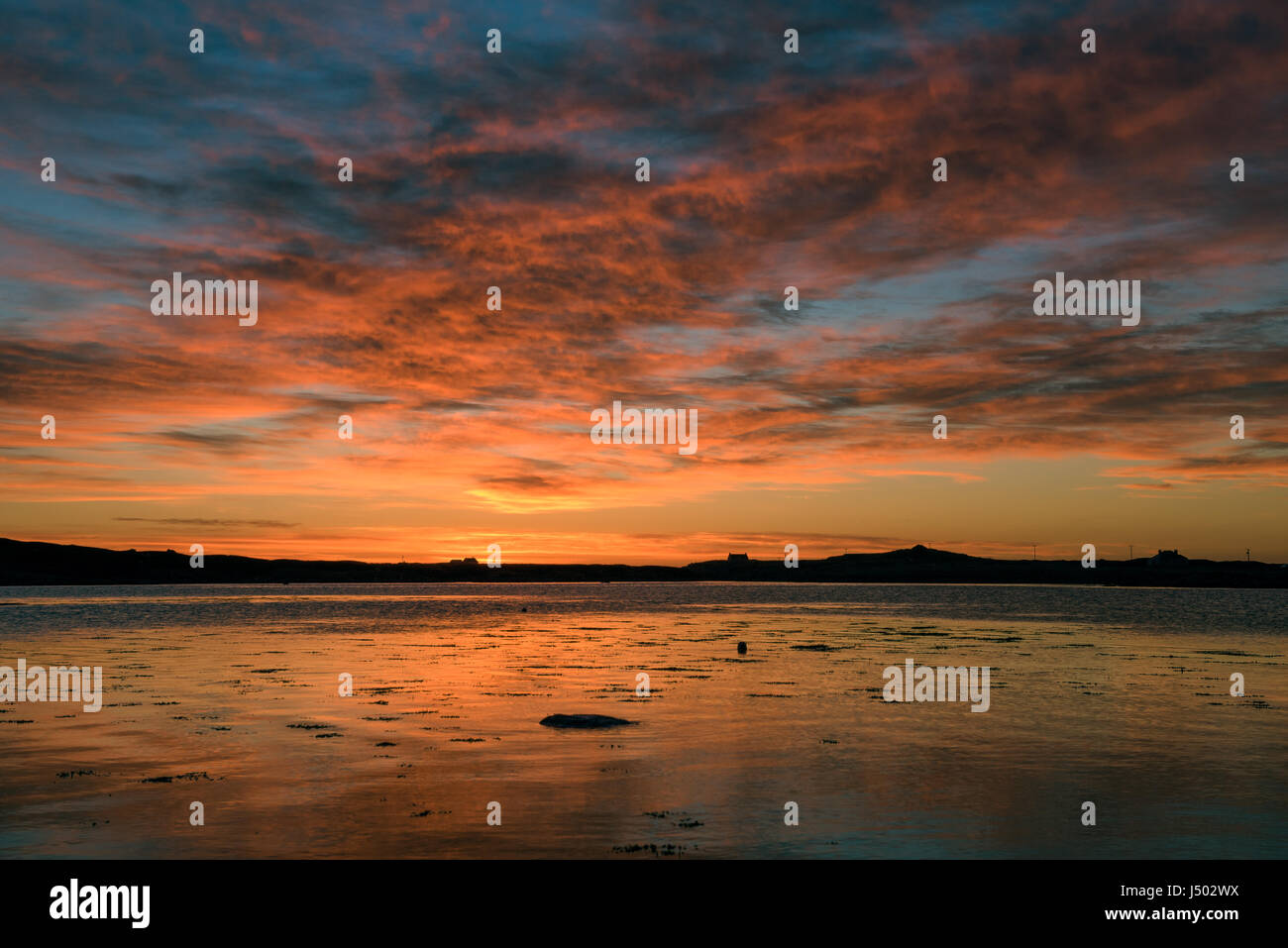 Tramonto sul Loch Aineort Sud Uist Scozia Scotland Foto Stock