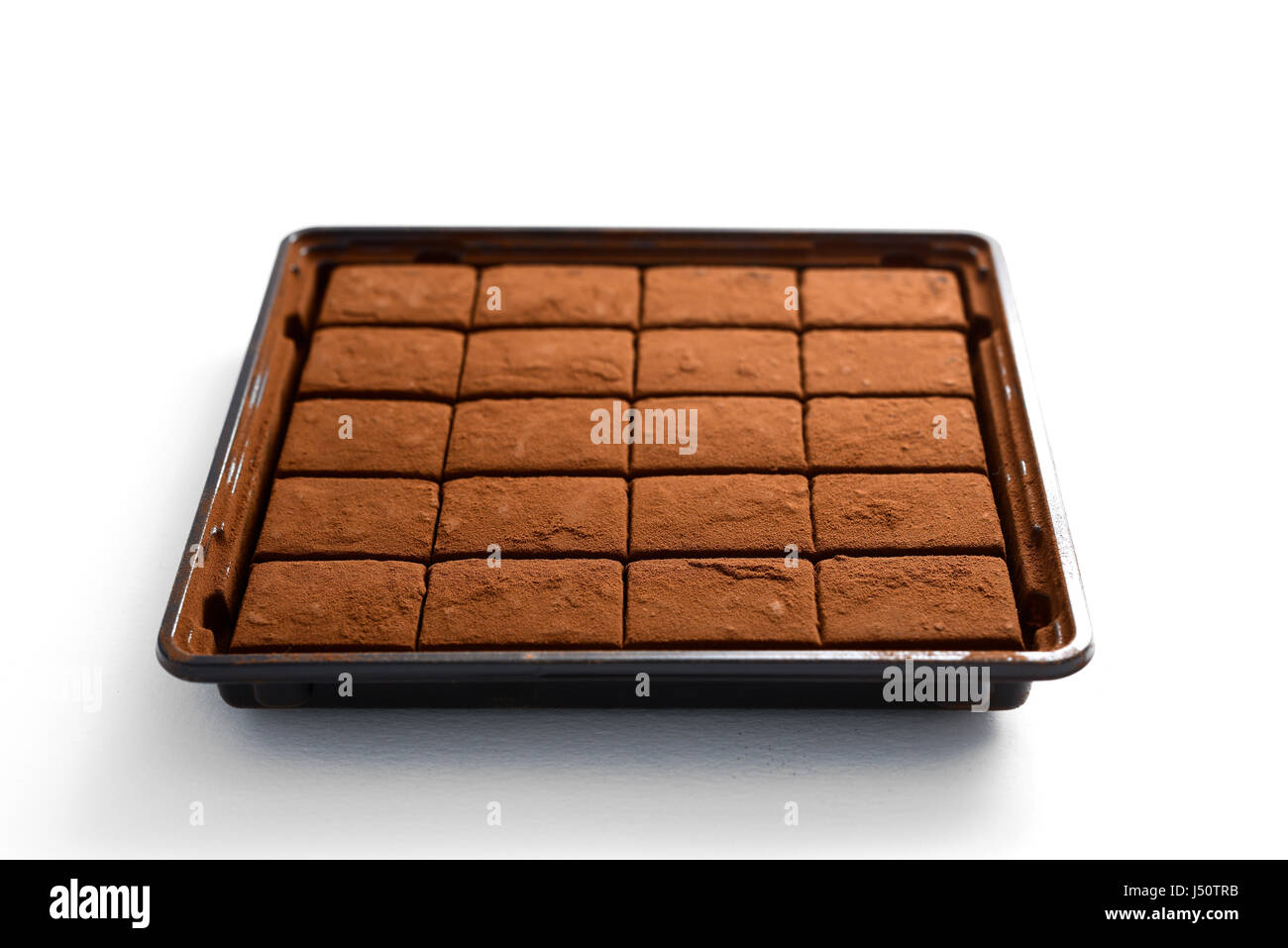 Cioccolato morbido isolato su bianco Foto Stock