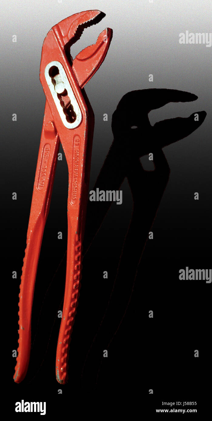 Attrezzo pinza gaspipe rapporti aziendali trattare transazioni aziendali business Foto Stock
