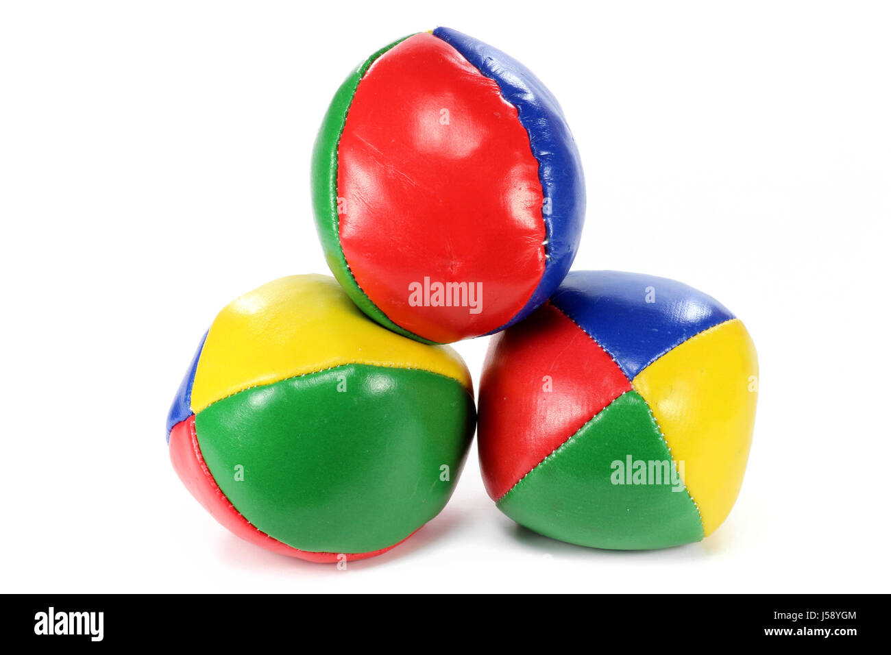 Juggling balls isolati su sfondo bianco Foto Stock