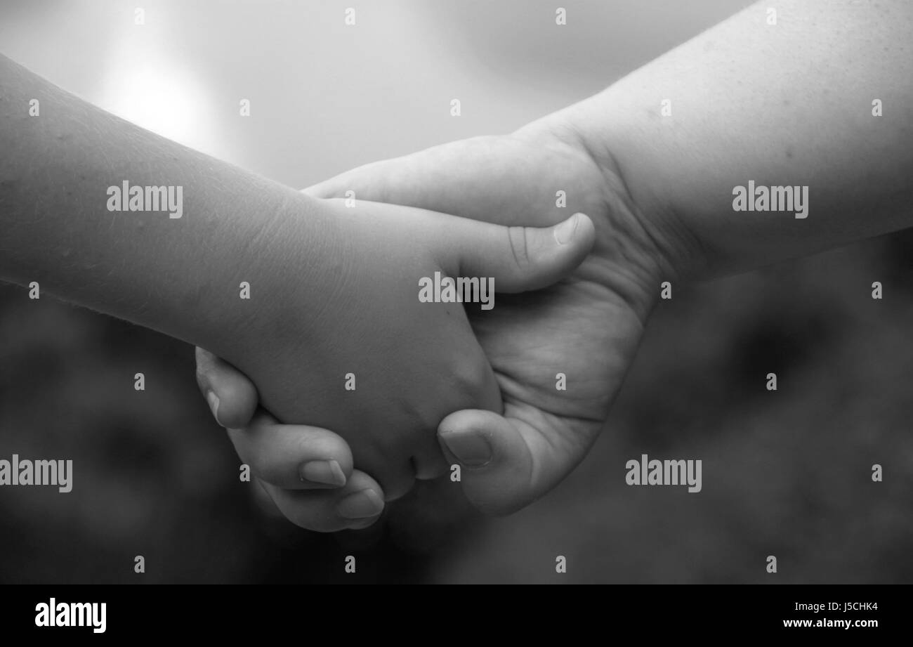 mano nella mano Foto Stock