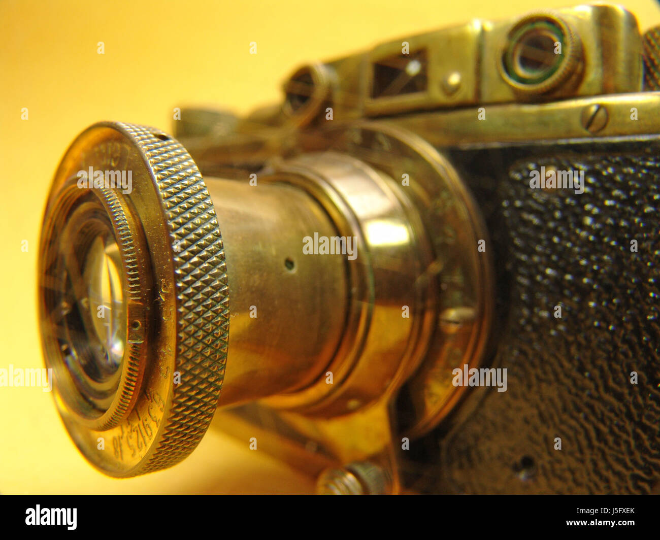 Dettaglio foto storiche della telecamera obiettivo d'oro imitazione di copia modello clich Foto Stock