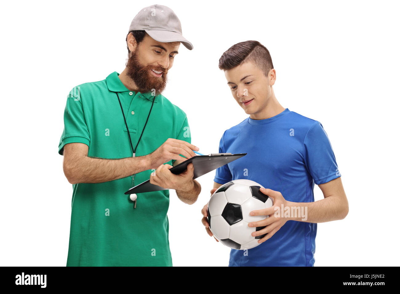 Allenatore di calcio di consigliare un lettore adolescente isolato su sfondo bianco Foto Stock