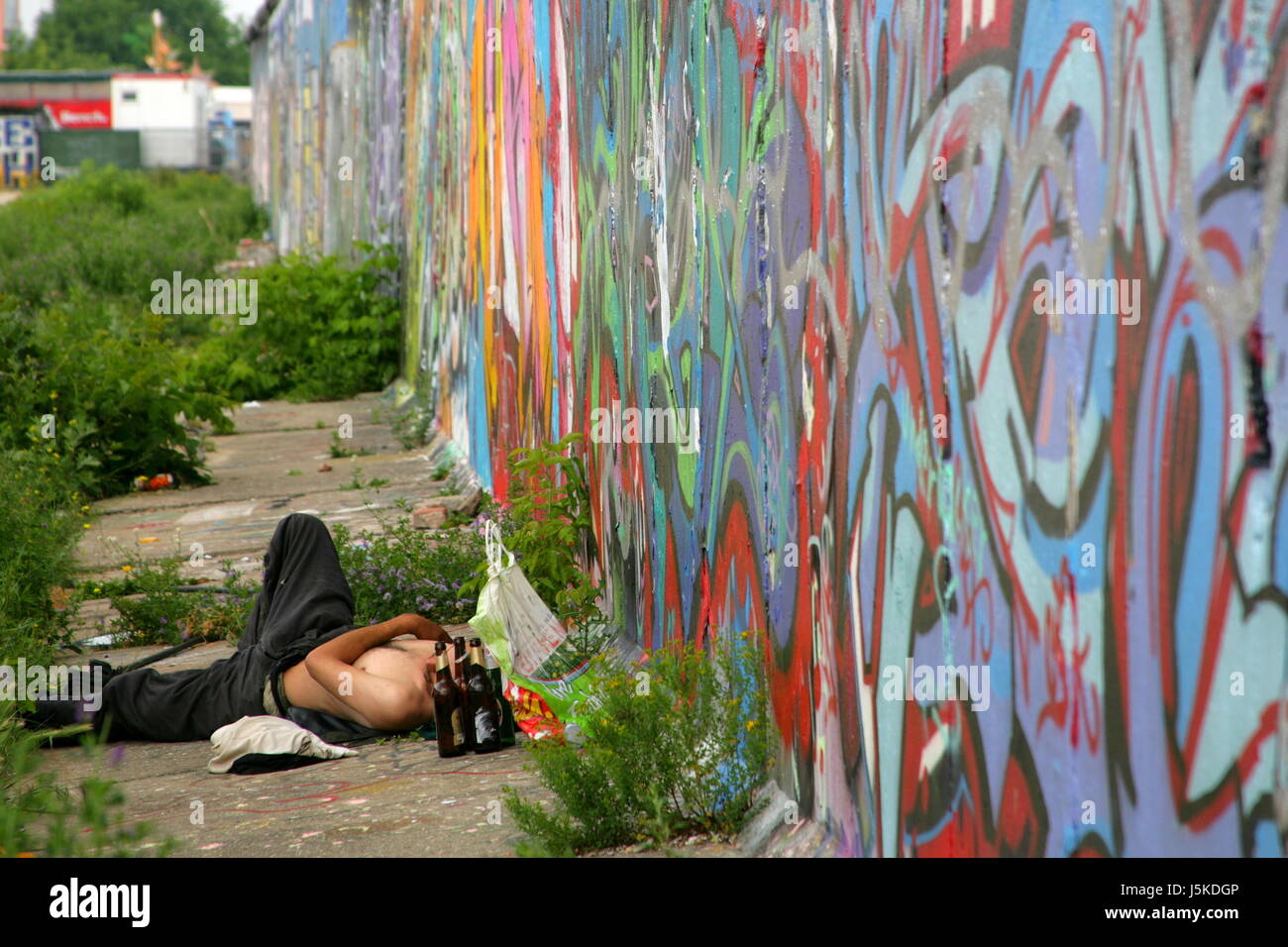 Muro di Berlino graffiti daub grafitti confine resti di sezionamento border crossing Foto Stock