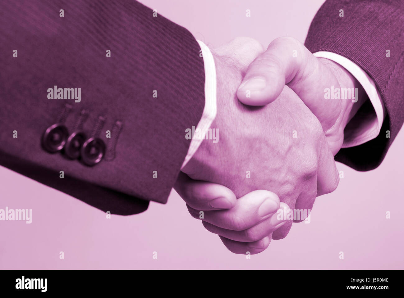 stretta di mano Foto Stock