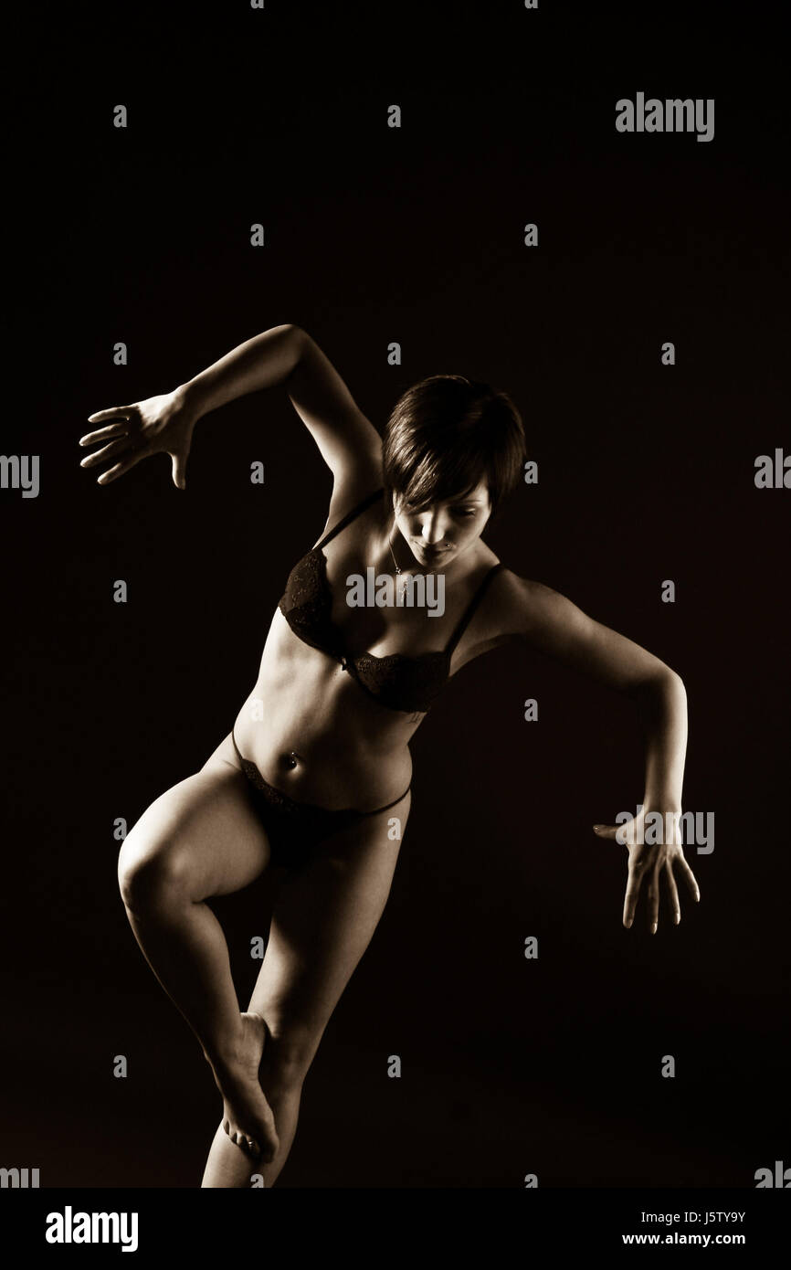 Ritratto di donna uomo uomo equilibrio donna donne sport sport studio Foto Stock