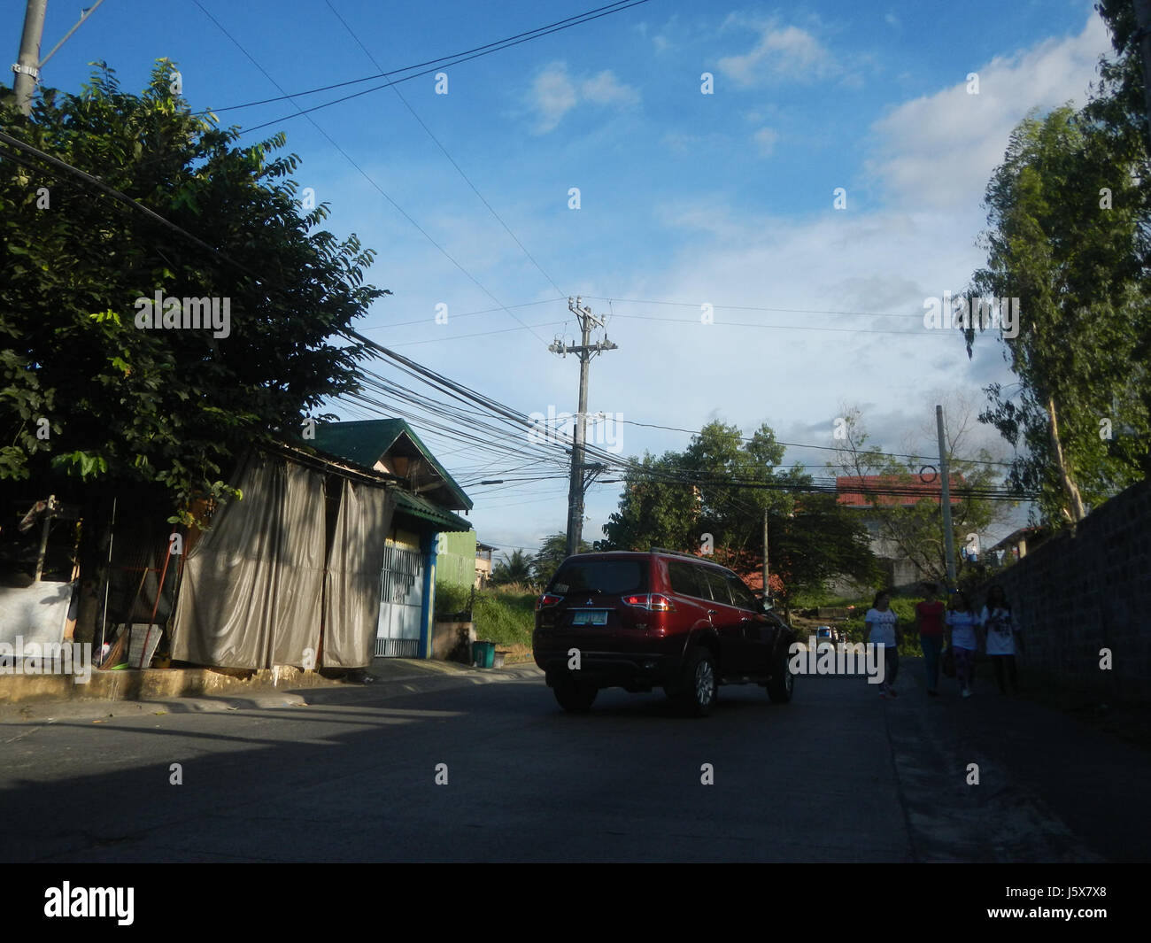 Metrogate Meycauayan II a Loma de Gato, Marilao, Bulacan, è un'area residenziale che probabilmente mette in evidenza lo sviluppo suburbano, fornendo case in una comunità ben pianificata all'interno delle Filippine. Foto Stock