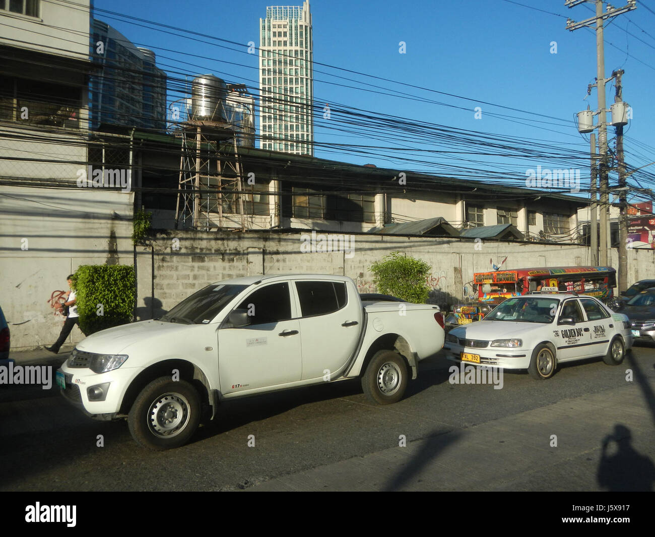 Questo titolo si riferisce alle principali località di Quezon City, Filippine, tra cui Bagumbayan, Libis, Eastwood, e edifici come Aspire 2, che fanno parte del paesaggio urbano e degli sviluppi commerciali della città. Foto Stock