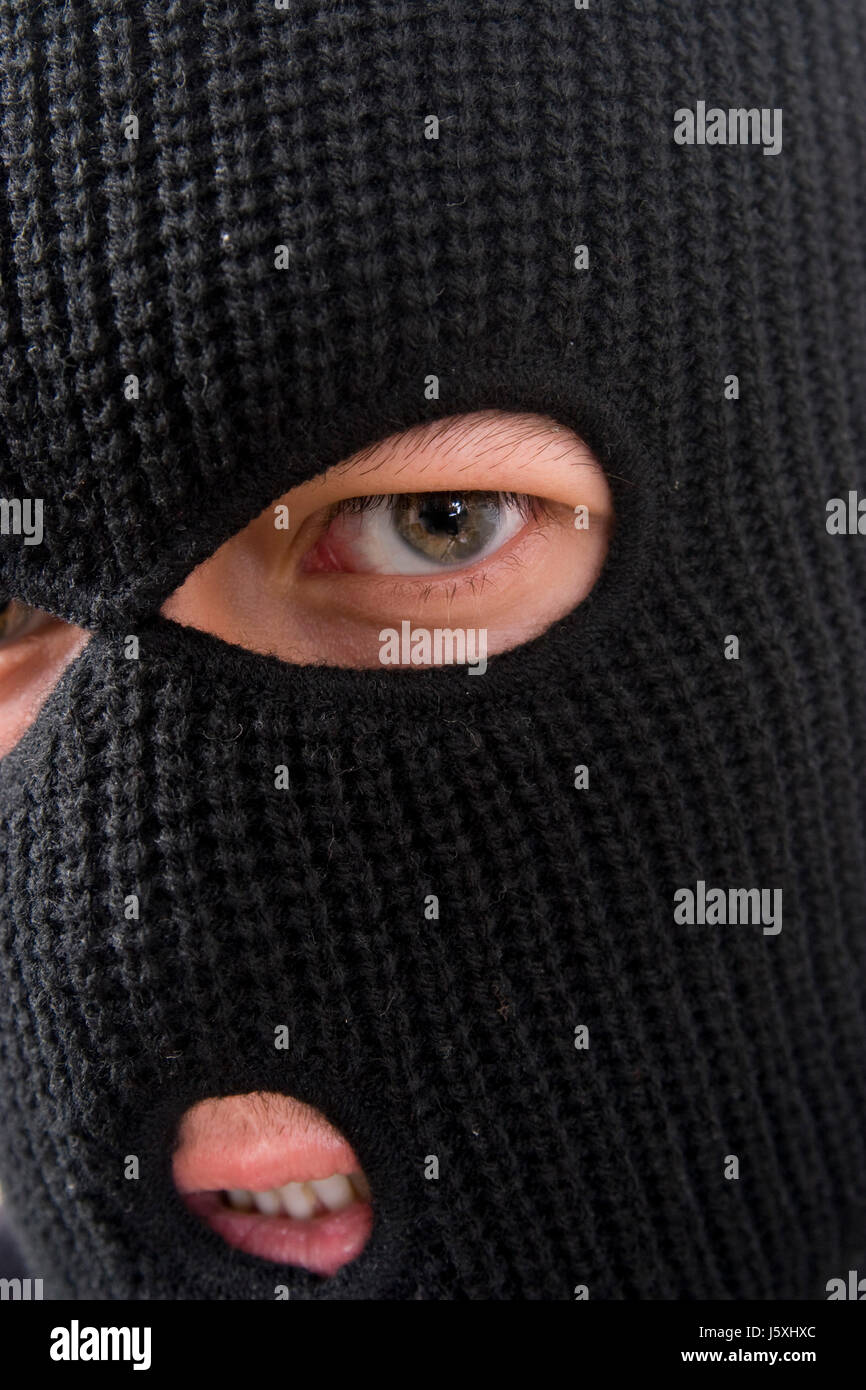 Legge peccant male male male passamontagna maschera corruzione criminale  faccia ordine Foto stock - Alamy