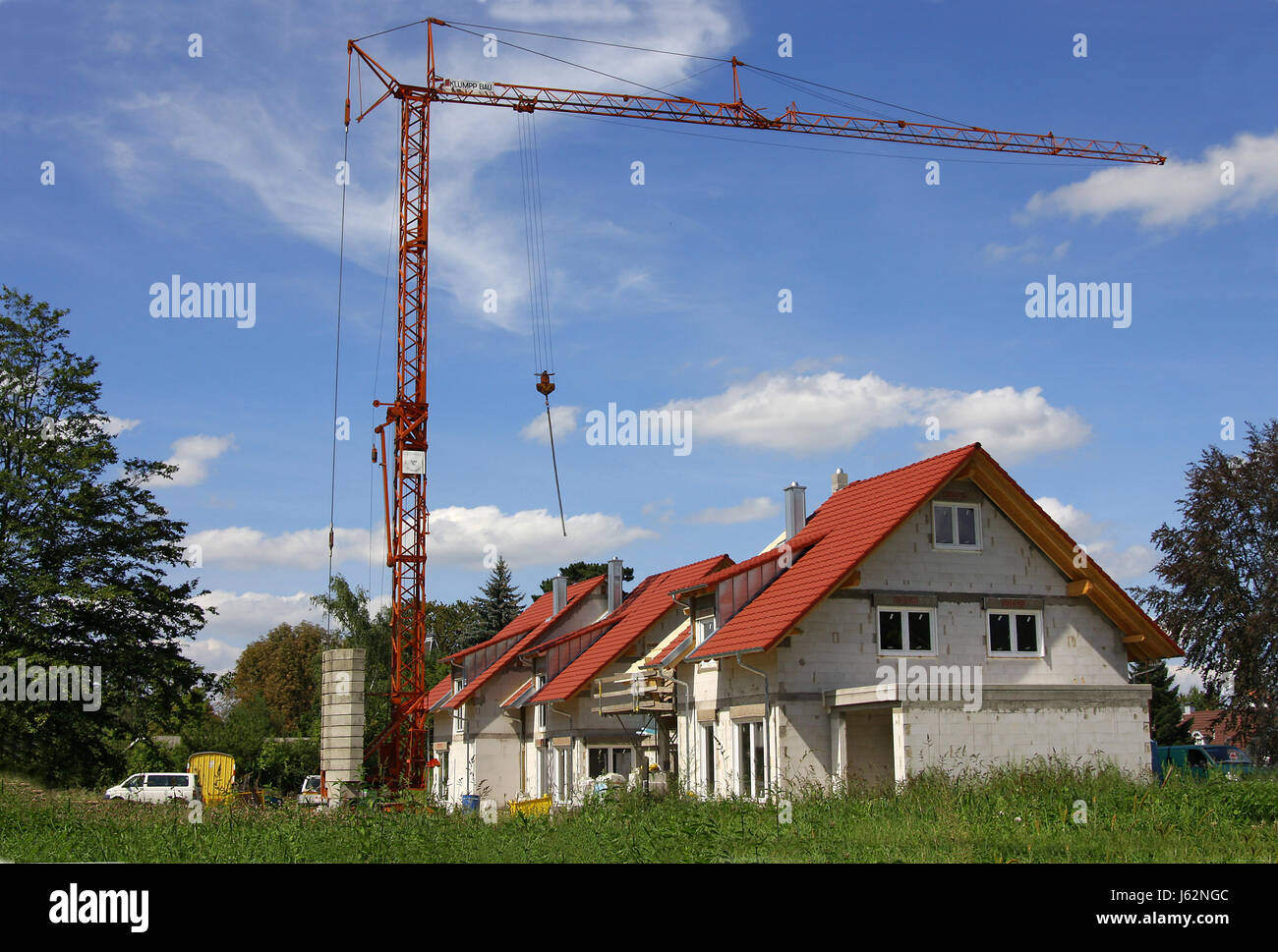 Nuovo edificio installatore casa-costruire carpenter casa bifamiliare sito in costruzione Foto Stock