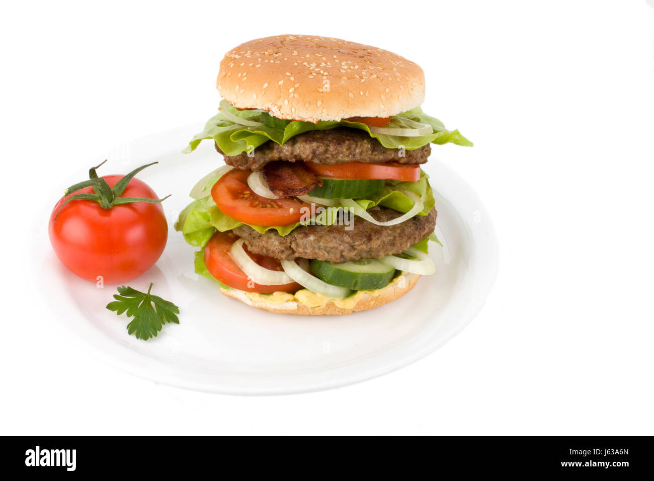 Hamburger su una piastra bianca Foto Stock