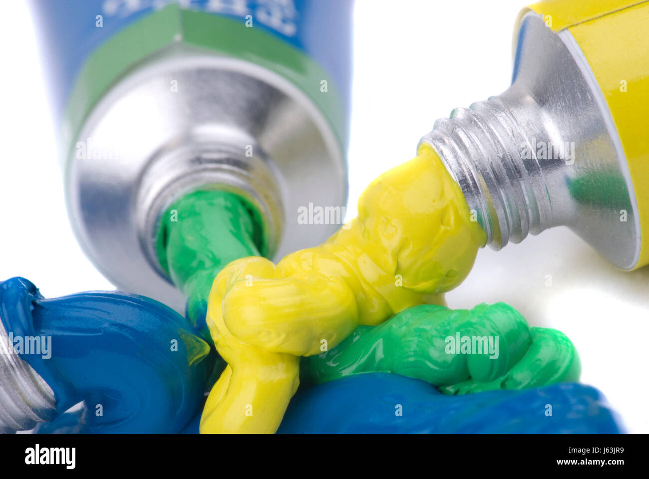 Il colore blu della vernice verde tinta olio tubo paint dyer staint pigmento macro close-up Foto Stock