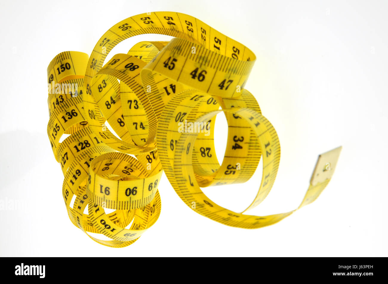 Isolate il nastro giallo come misura di una spirale Foto Stock