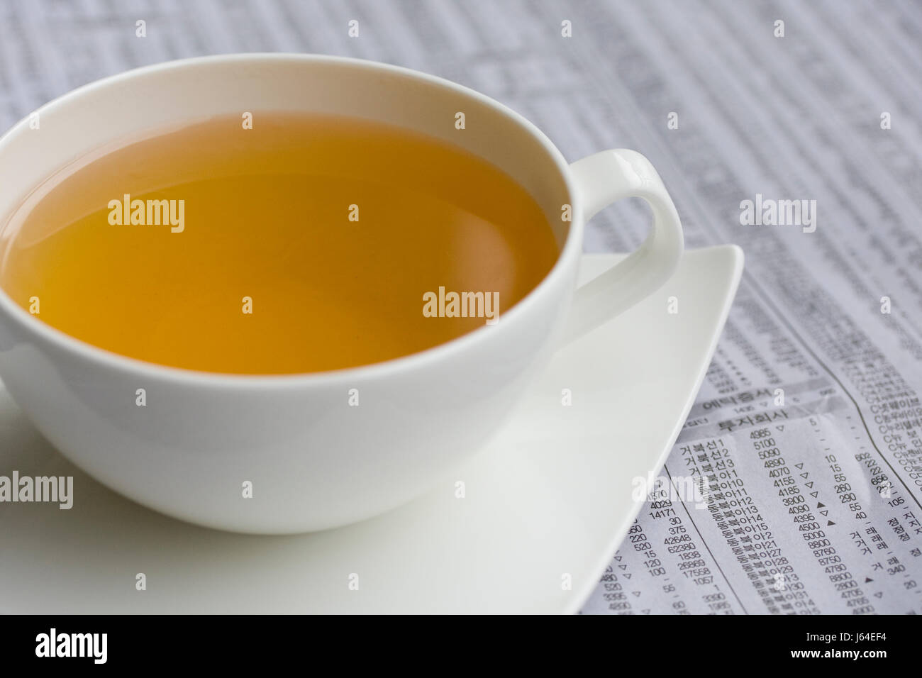 Tazza di tè quotidiani lucida quotidiana stampa Rassegna stampa periodici riviste Foto Stock