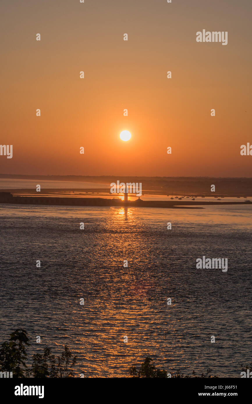 Sunset over hurst castle Foto Stock