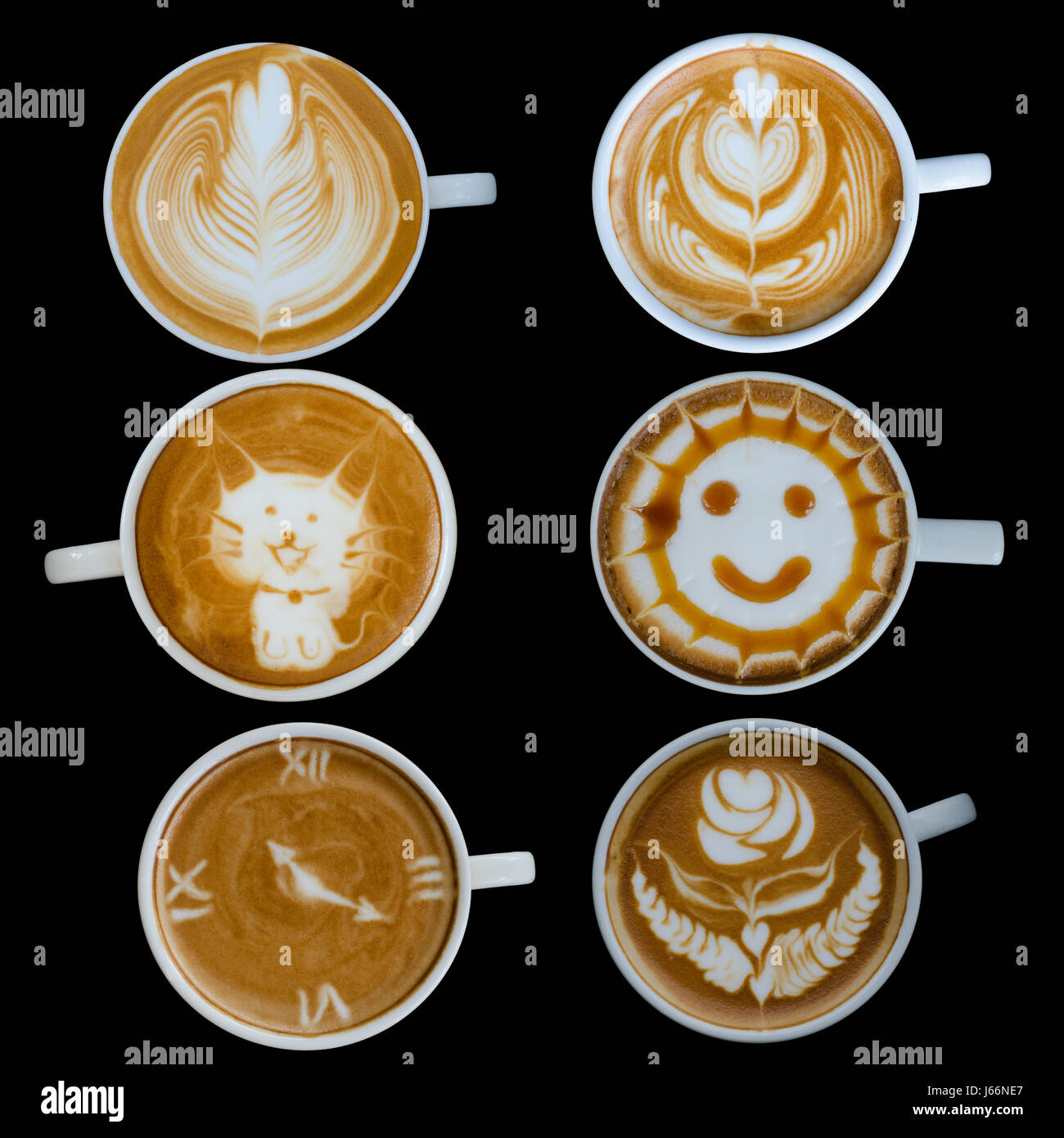 Tazze di latte art forme isolate su sfondo nero Foto Stock