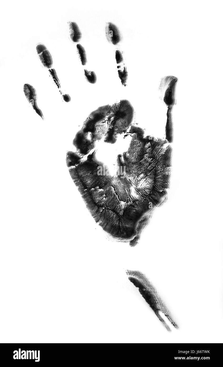 Stampa di una mano umana su vetro utilizzando nero scuro pitture ad acquerello. Foto Stock