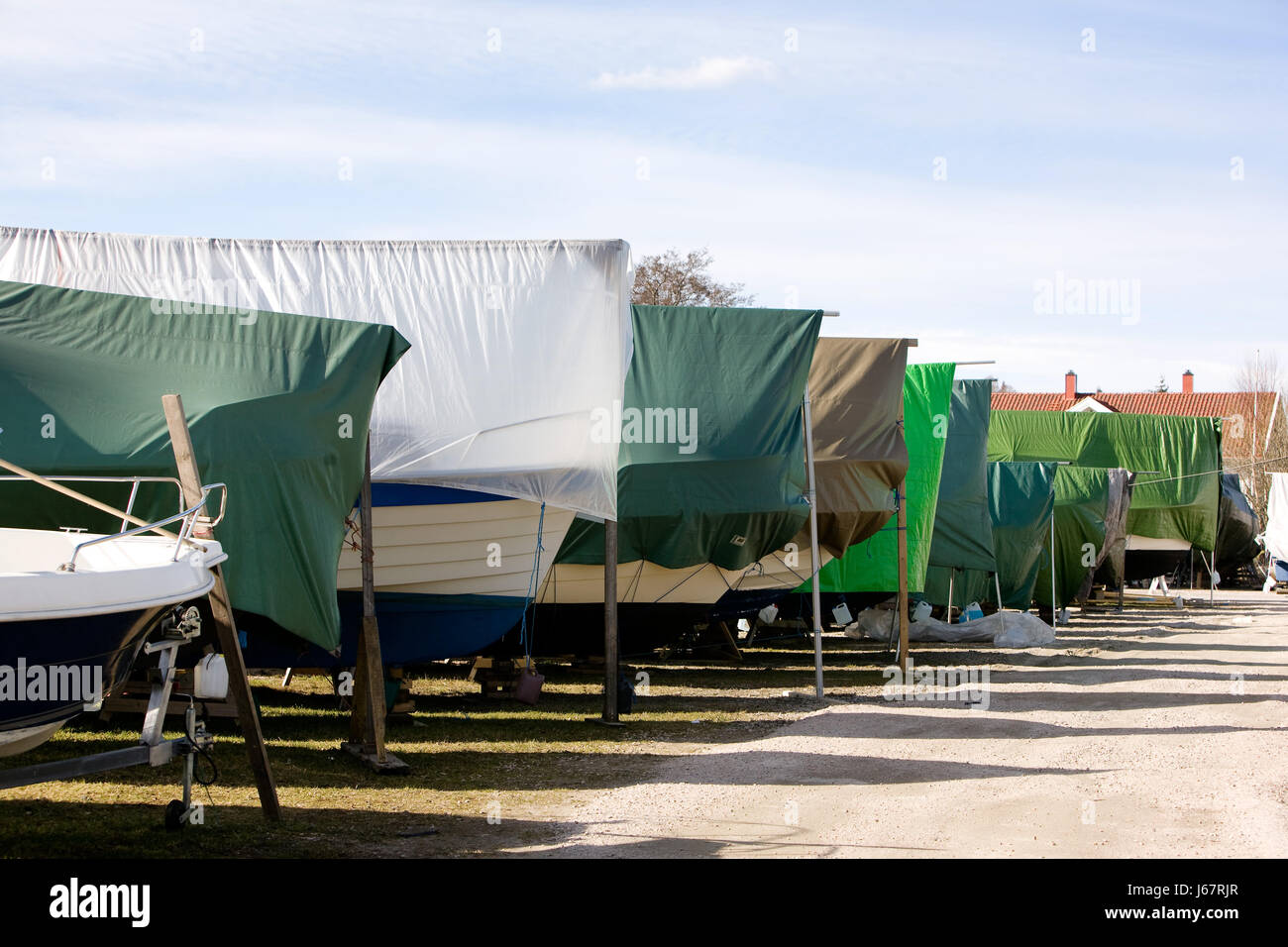 In inverno il legno antico porto di vela piccolo piccolo breve Norvegia hobby la riparazione Foto Stock