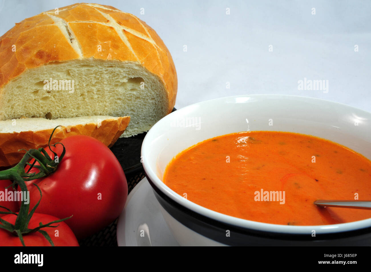 Cibo aliment piatto di salute pasto pranzo Minestra di pomodoro vaso sano cibo aliment pane Foto Stock