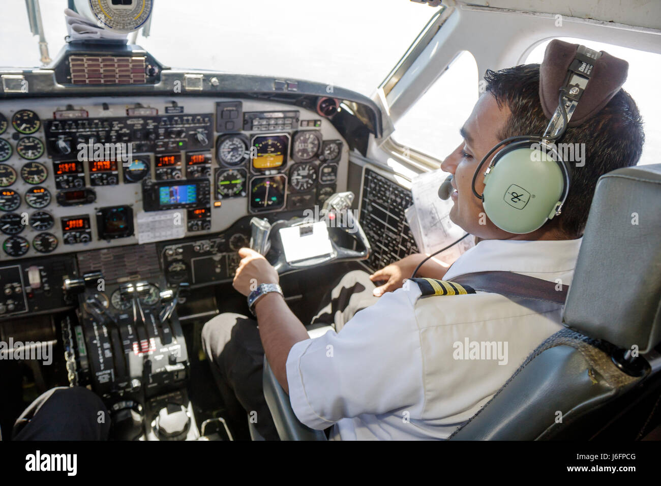 Florida Pensacola,Pensacola Regional Airport,Continental Airlines,commuter flight,Asian man men maschio,co pilot,working,work,employee worker worker sta Foto Stock