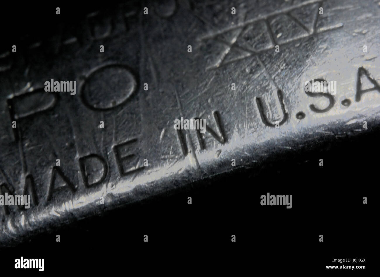 La fotografia macro di vecchi metalic più leggeri. Vi è una lapide realizzata in U.S.A.sul lato inferiore. Foto Stock