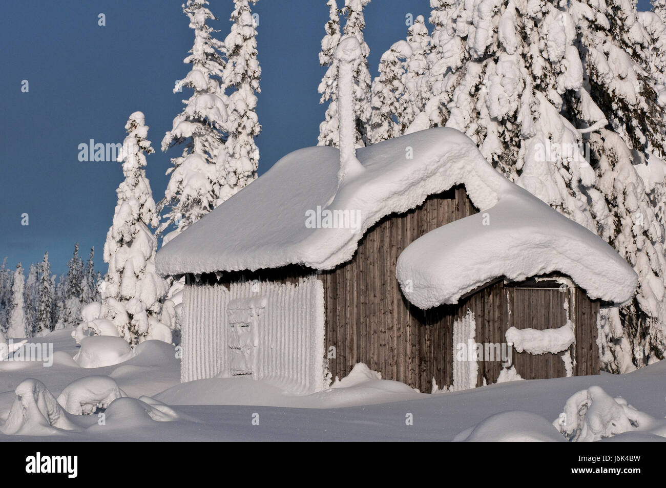 Case nella neve profonda Foto Stock
