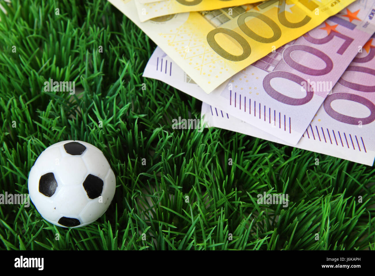 Il calcio e il denaro Foto Stock