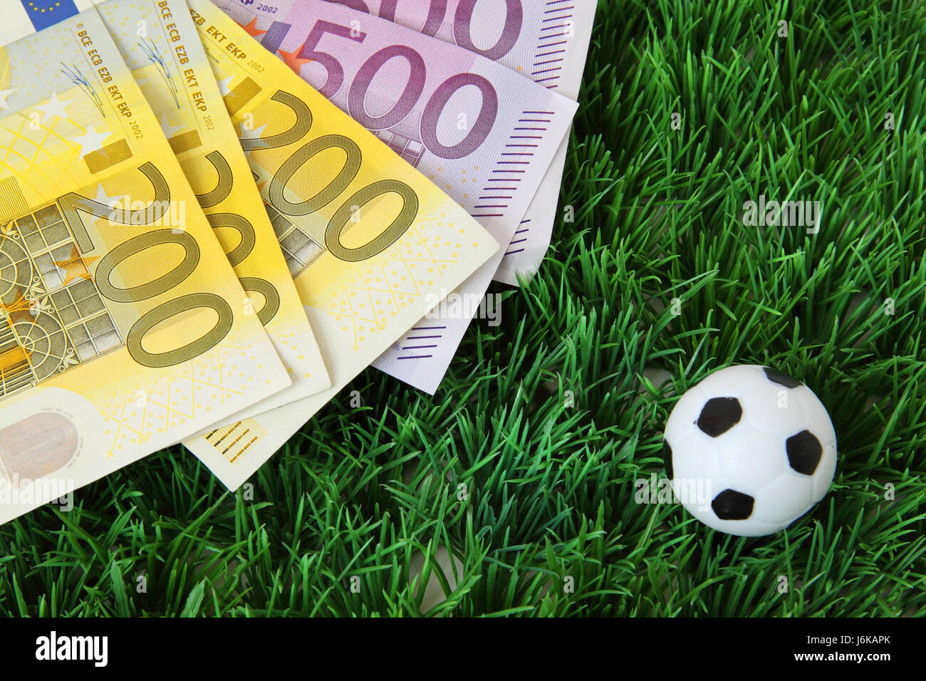 Il calcio e il denaro Foto Stock