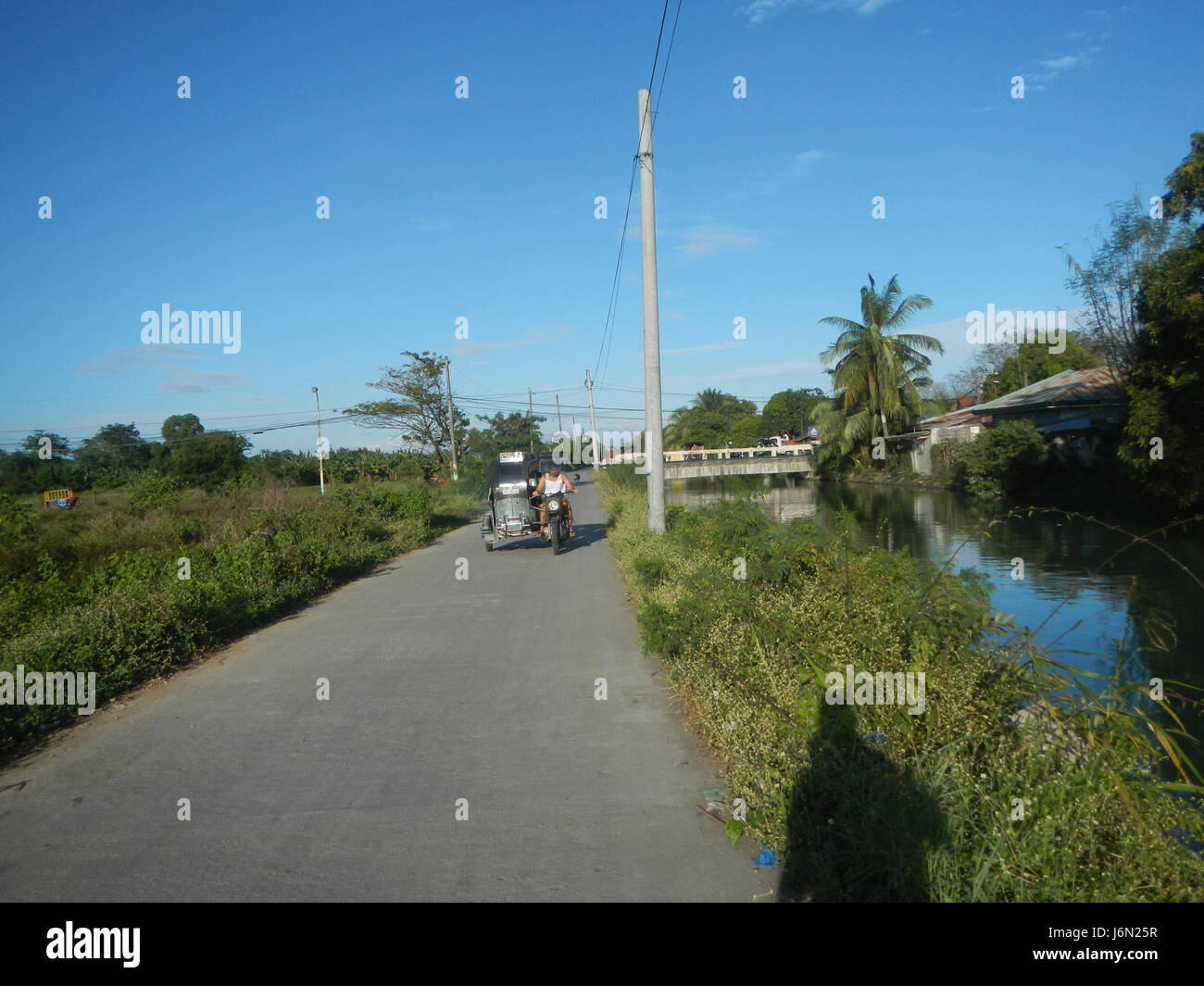 09588 risaie, praterie, alberi, case di irrigazione, Sabang Baliuag, Bulacan ponti stradali 13 Foto Stock