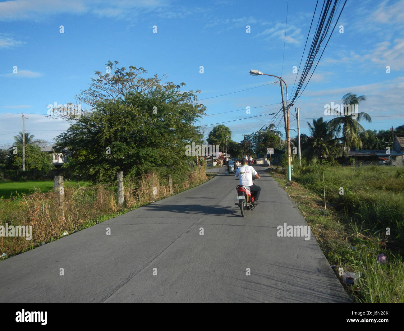 09678 risaie, praterie, alberi, case di irrigazione, Sabang Baliuag, Bulacan ponti stradali 04 Foto Stock