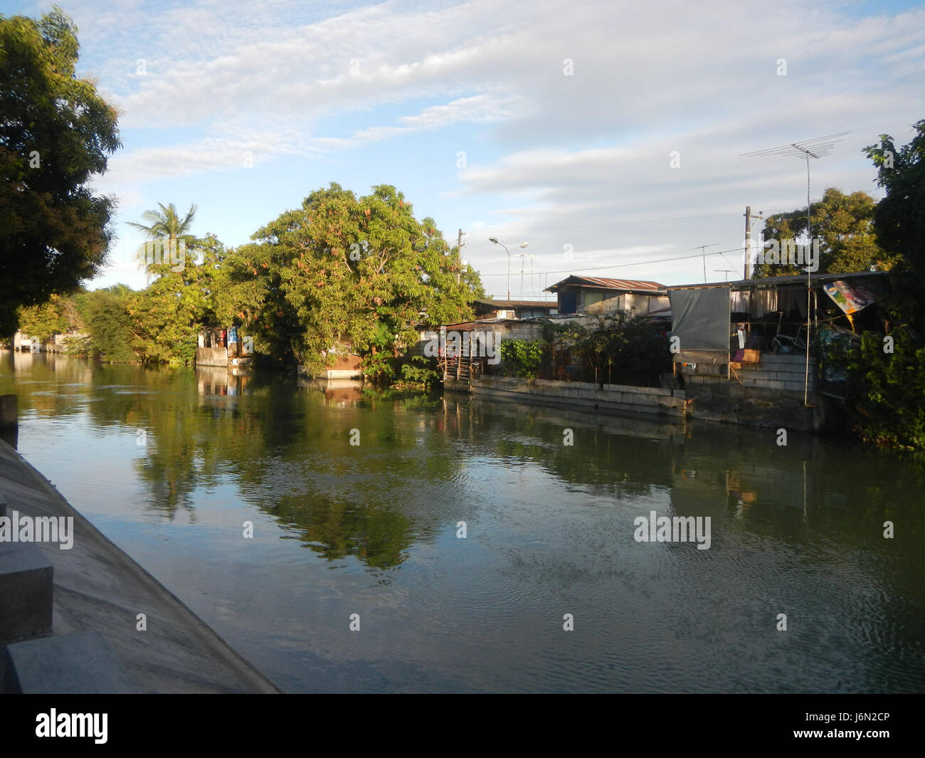 09771 risaie, praterie, alberi, case di irrigazione, Sabang Baliuag, Bulacan ponti stradali 22 Foto Stock