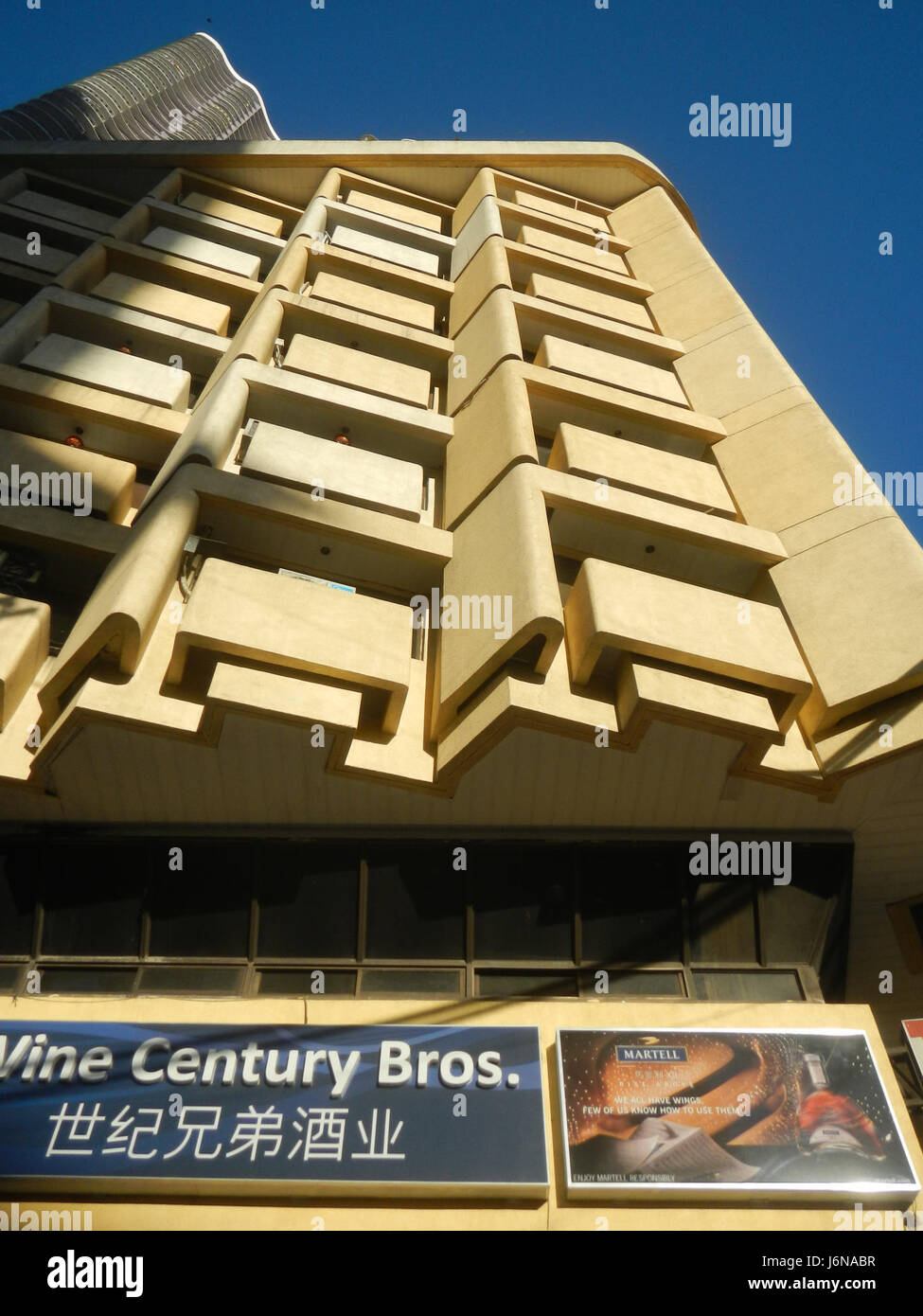 Un riferimento agli edifici Anchor Skysuites e Mandarin Square situati a Santa Cruz, Binondo, Manila, noti per la loro architettura moderna e lo sviluppo urbano nell'area. Foto Stock