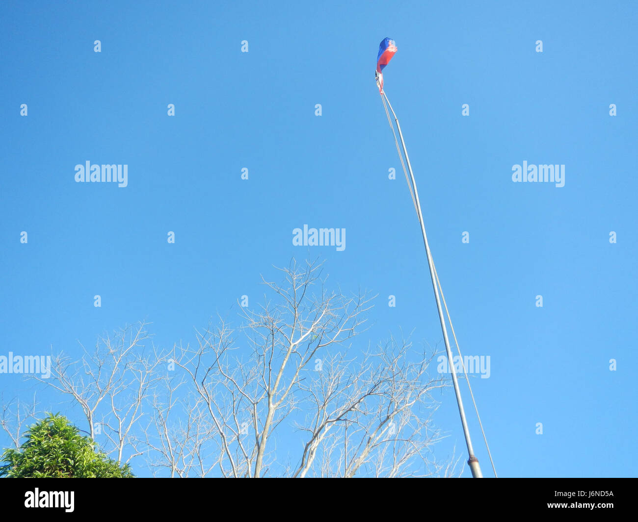 La Alexis G. Santos National High School Liciada del 09514 a Bustos, Bulacan, Filippine, è un'istituzione educativa. L'immagine cattura l'architettura e l'ambiente educativo della scuola nella comunità locale. Foto Stock