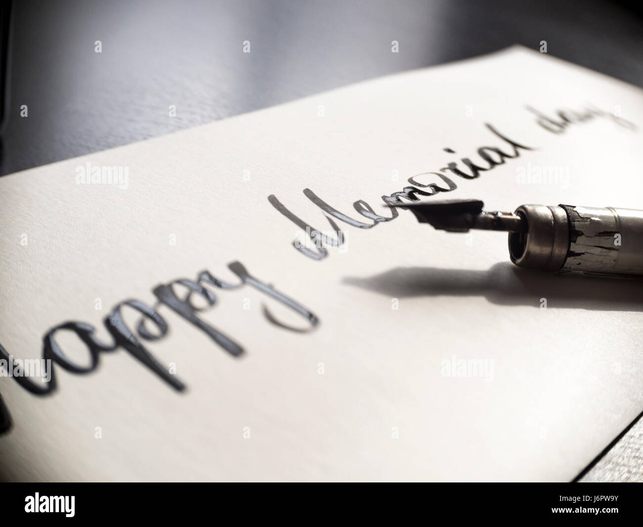 Felice giorno memoriale della calligrafia e scritte post card. Estremamente close-up. Foto Stock