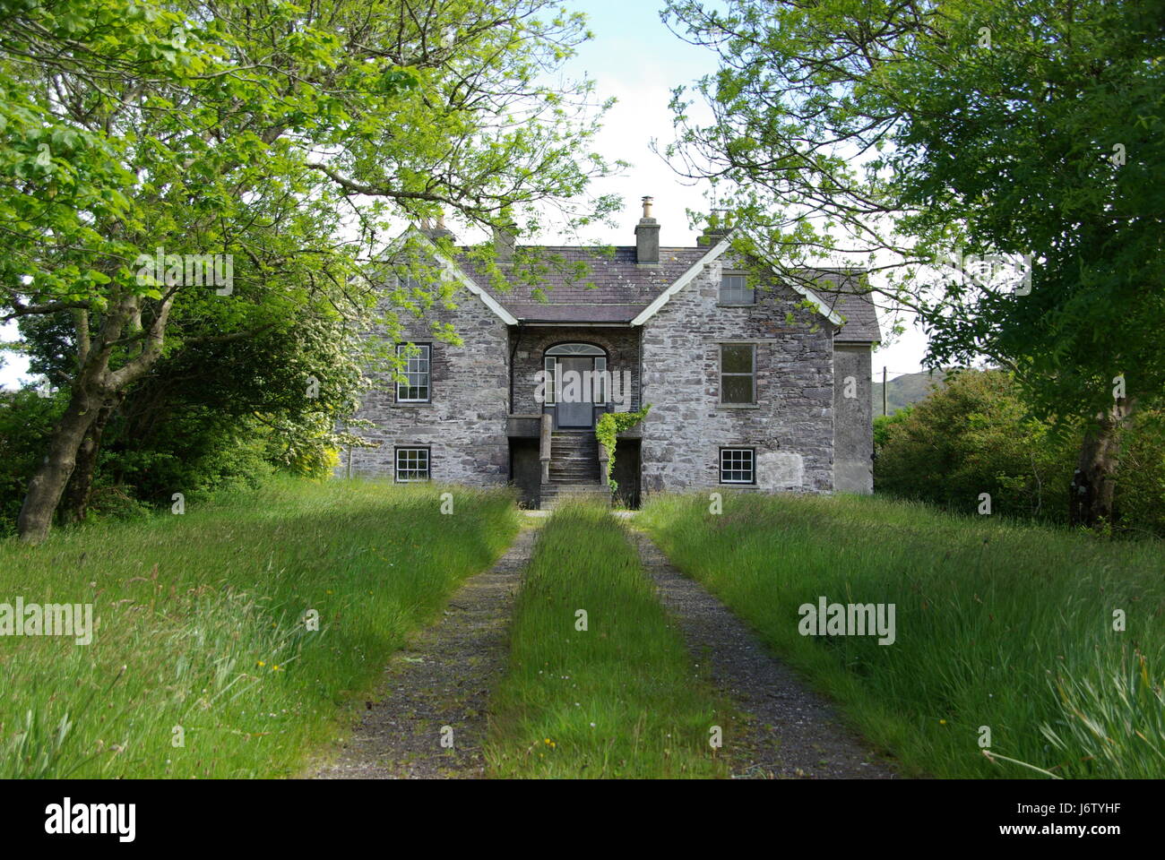Cottage Irlanda Irish House Edificio giardino facciata tradizionale di stile Foto Stock