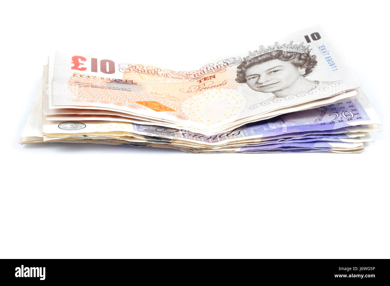 Le note di sterline inglesi foglio di carta carta denaro libbre macro regina utilizzato i fondi Foto Stock