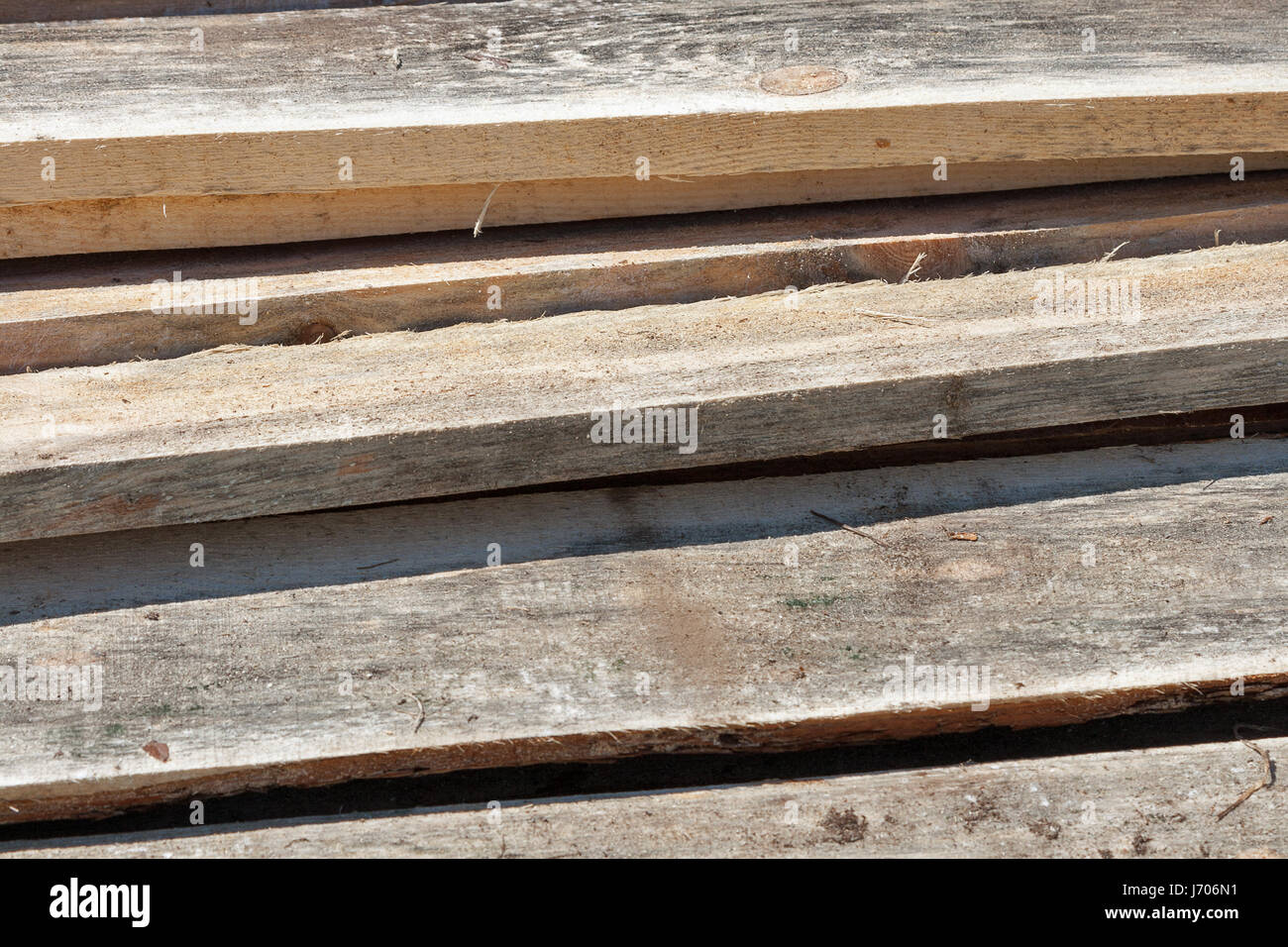 Vecchie schede unplaned closeup, outdoor sito in costruzione Foto Stock