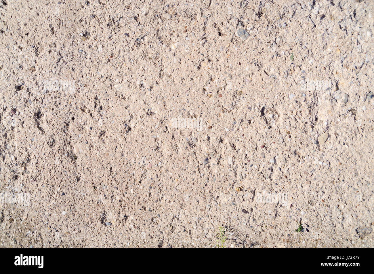 Vecchio ruvida consistenza di calcestruzzo in presenza di luce solare Foto Stock