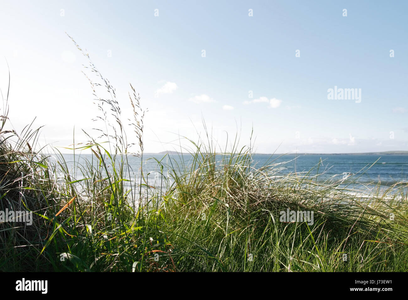 Spiaggia mare spiaggia mare costa dune Irlanda scenic firmamento cielo sale Foto Stock