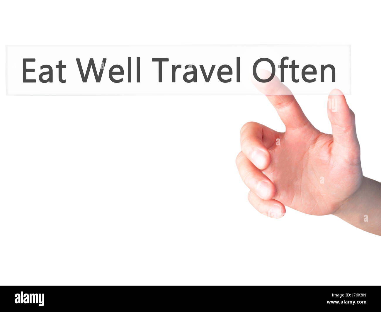 Mangiare bene è spesso in viaggio - Mano premendo un pulsante sul fondo sfocato concetto . Business, tecnologia internet concetto. Stock Photo Foto Stock