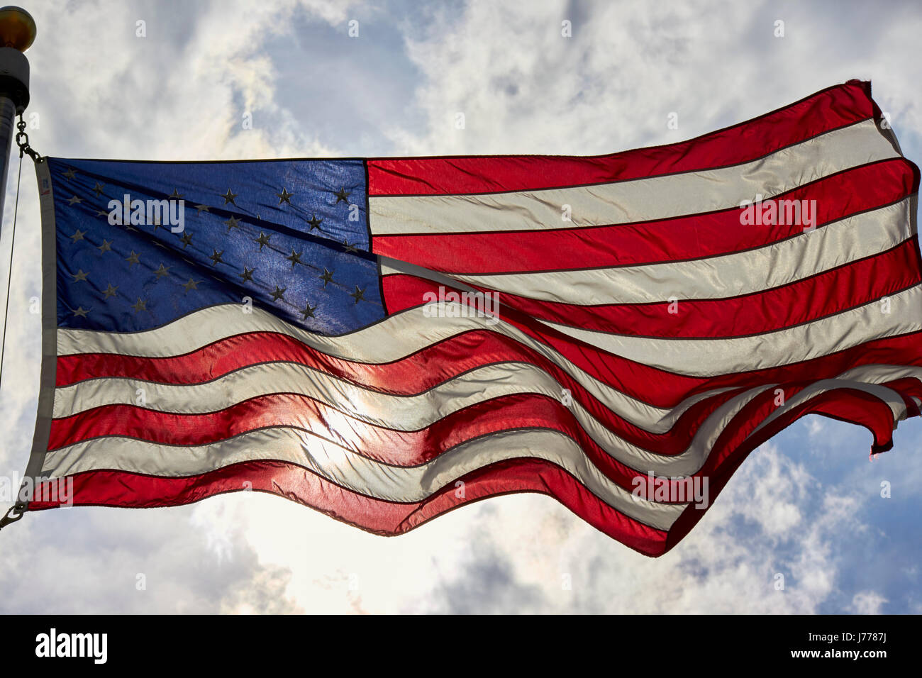 Noi battenti bandiera retroilluminati da sole Washington DC USA Foto Stock
