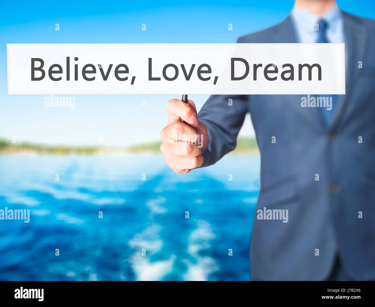 Credo, amore, Sogno - Imprenditore mano azienda segno. Business, tecnologia internet concetto. Stock Photo Foto Stock