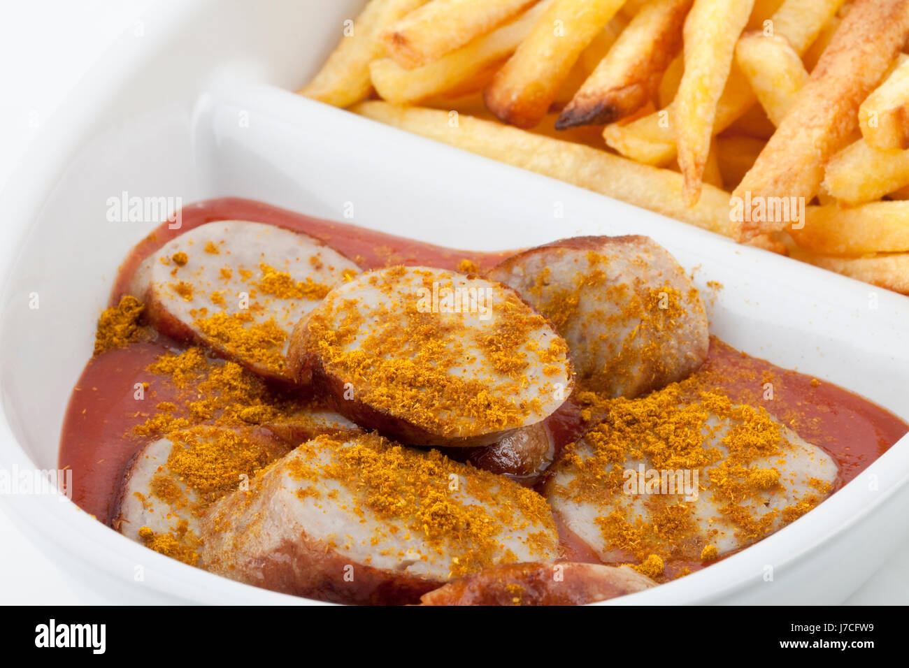 Currywurst con patate fritte Foto Stock