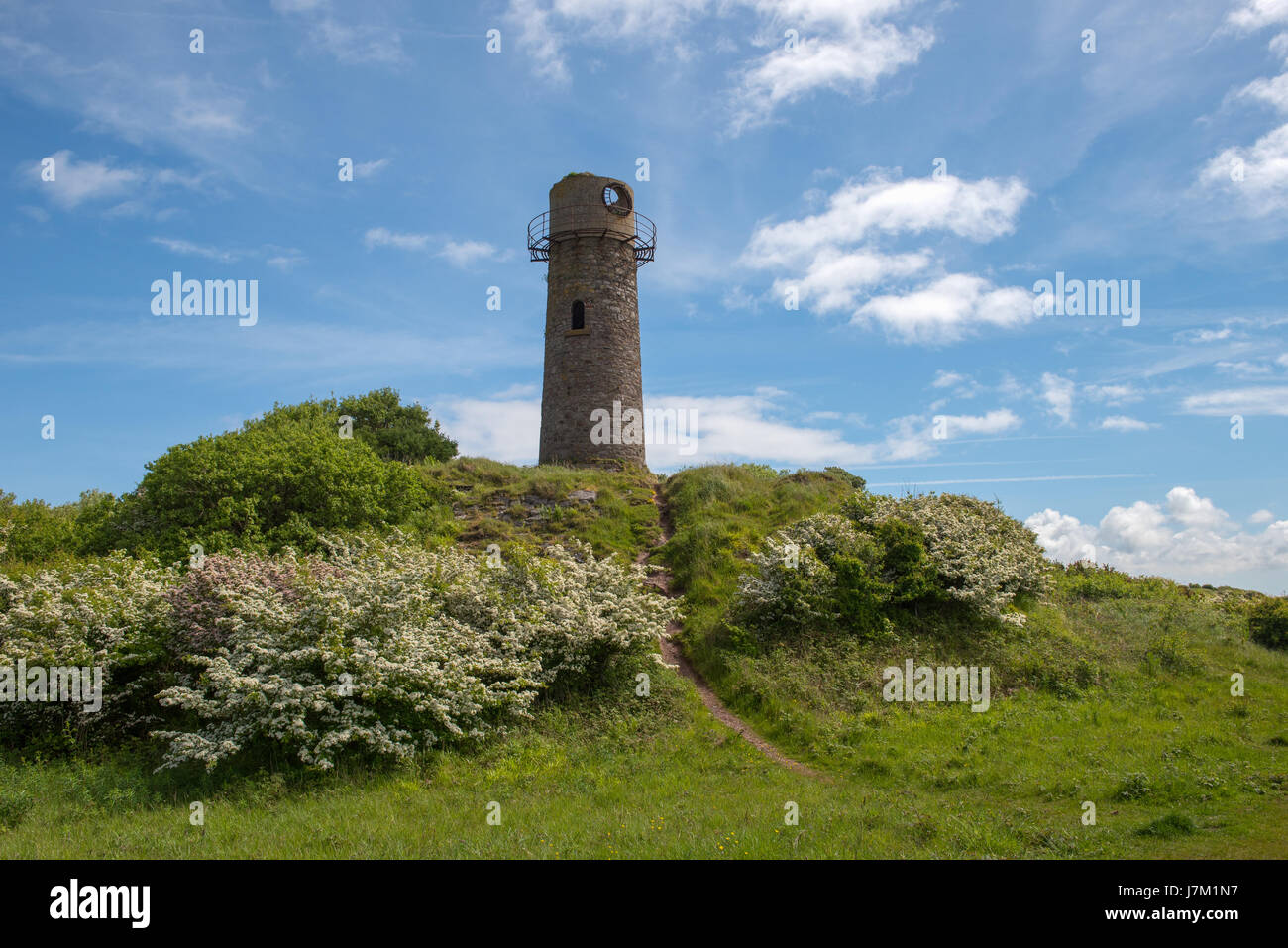 La vecchia pietra costruito il faro sulla Hodbarrow riserva naturale vicino a Millom in Cumbria Foto Stock