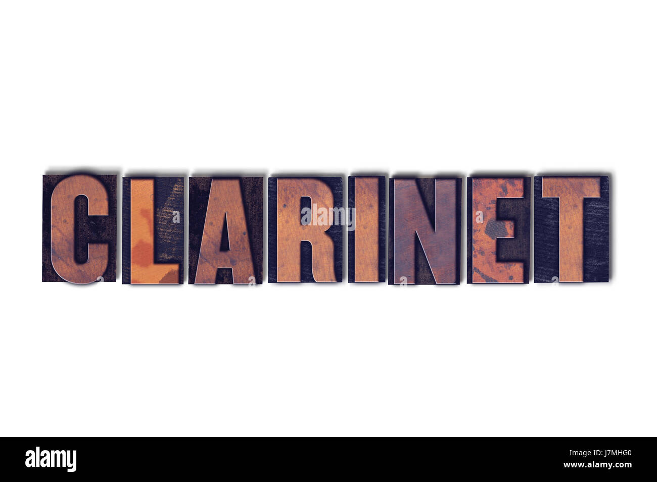 La parola clarinetto concetto e il tema scritto in legno vintage tipo di stampa in rilievo su uno sfondo bianco. Foto Stock