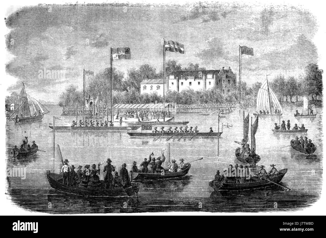 L'Alsterregatta di Amburgo è un tradizionale evento annuale di canottaggio sul lago Alster. Questo evento, raffigurato nell'immagine, mette in mostra squadre di canottaggio competitive in un'atmosfera festosa, attirando grandi folle e proponendo vari sport acquatici. Foto Stock