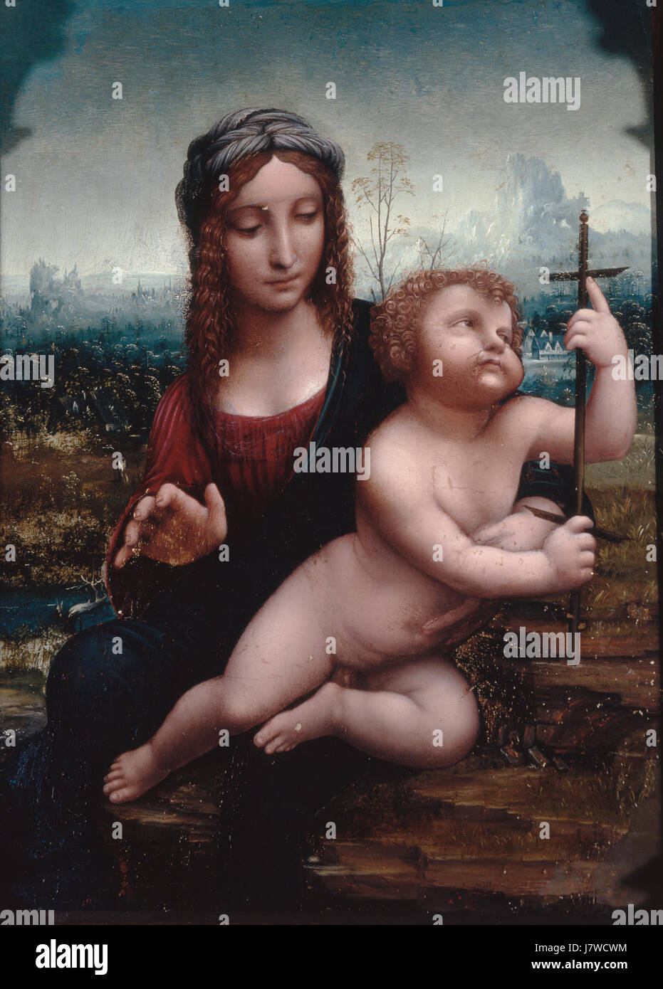 Questa immagine rappresenta la Virgen del Huso, un'immagine religiosa venerata nella cultura spagnola. La rappresentazione ritrae spesso la Vergine Maria con un mandrino, simboleggiando il suo ruolo di protettrice del lavoro domestico e dei compiti di womenÂ, in particolare in relazione alla filatura e alla tessitura. Foto Stock