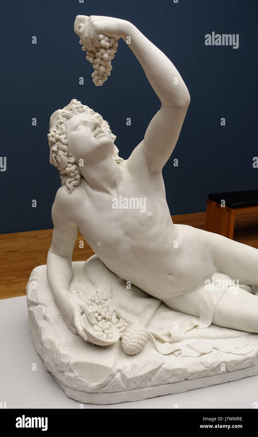 Questo titolo si riferisce a una scultura in marmo di Bacco creata da Lorenzo Nencini nel 1830, ospitata a Villa Vauban a Lussemburgo. L'opera riflette il tema classico di Bacco, il dio romano del vino, e la sua rappresentazione artistica durante il XIX secolo. Foto Stock
